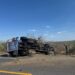 En Jiménez: Un masculino lesionado tras volcar su trailer; Guardia Estatal auxilia